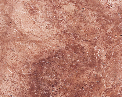 Red travertine from Turkey in tiles and slabs